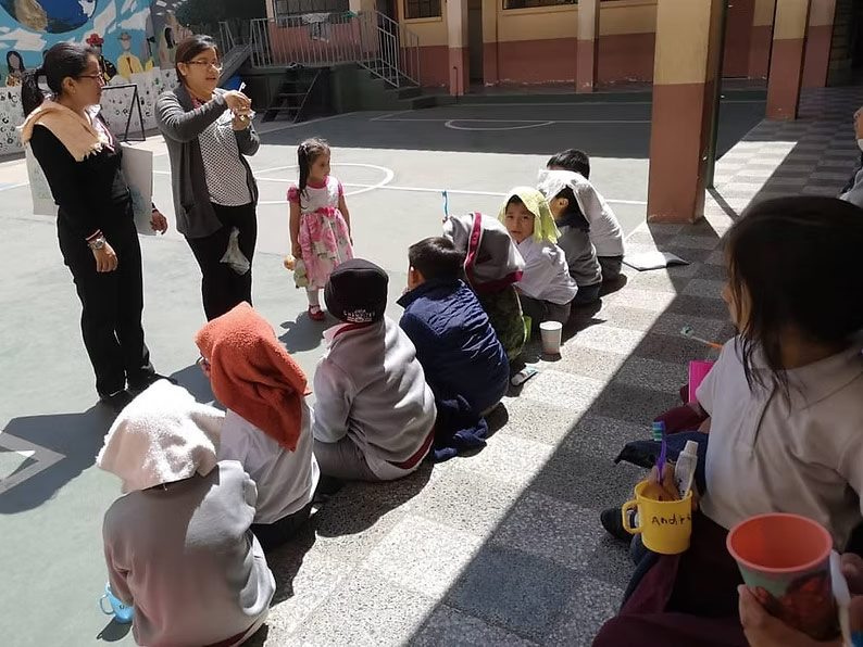 students and instructors gathered in the courtyard