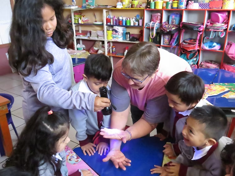 academy students gather around an instructor