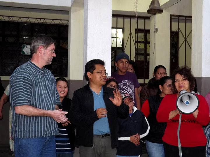 instructors make an announcement at a school function