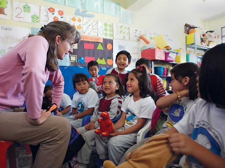 instructor with students in the classroom